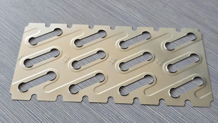 Refrigerator evaporator fins for fin die tooling